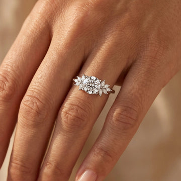 Round Cut Floral Engagement Ring with Marquise Side Stones
