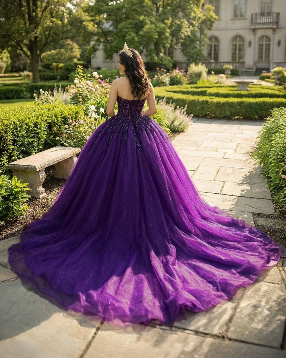 Vedress deep purple quinceanera ballgown back view, lace up corset back, glitter tulle sweep train with sparkling beading details