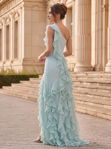 Vedress sage chiffon formal gown back view,open back design,continuous cascading ruffle details,sweep train mermaid silhouette,stone steps scenery
