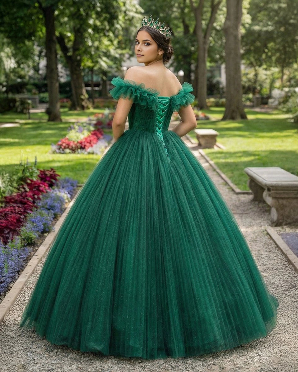 Vedress emerald green quinceanera ballgown back view, lace-up corset back, floor length pleated glitter tulle skirt