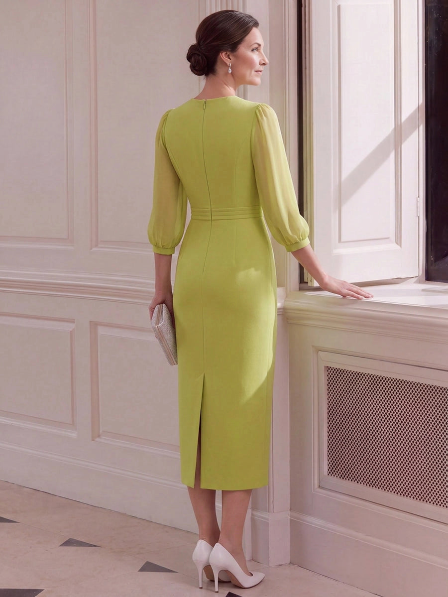 Vedress lime sheath mother of bride gown back view,center zipper closure,back vent slit,long sheer chiffon sleeves,elegant indoor room scenery
