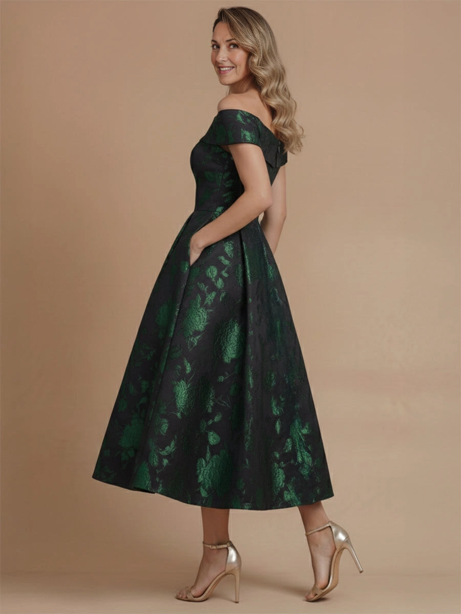 Vedress green floral midi mother bride gown back view,off‑shoulder cut,hidden back zipper,functional side pockets,beige solid studio backdrop