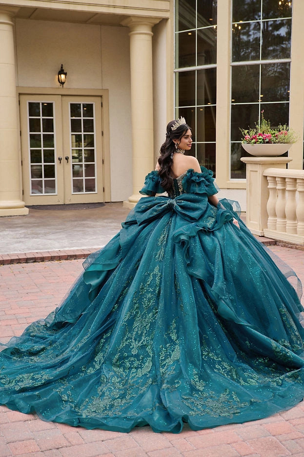 Back view Vedress emerald green quinceanera gown corset lace-up back oversized ruffle bow long glitter train