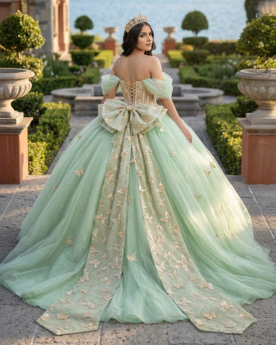 Vedress sage green quinceañera dress lace up corset back with large bow and butterfly embroidery rear view