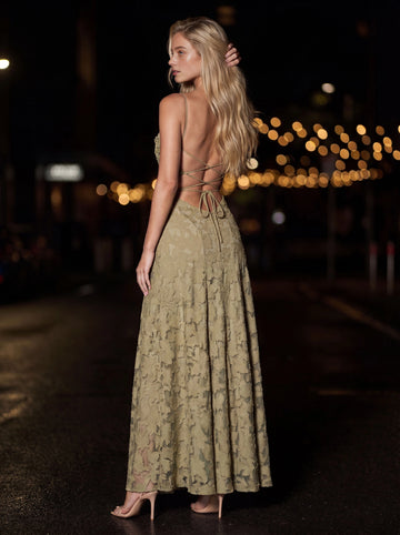 Vedress olive green formal gown,back view open crisscross lace‑up tie‑back with self tie bow,textured floral maxi skirt,night street bokeh background