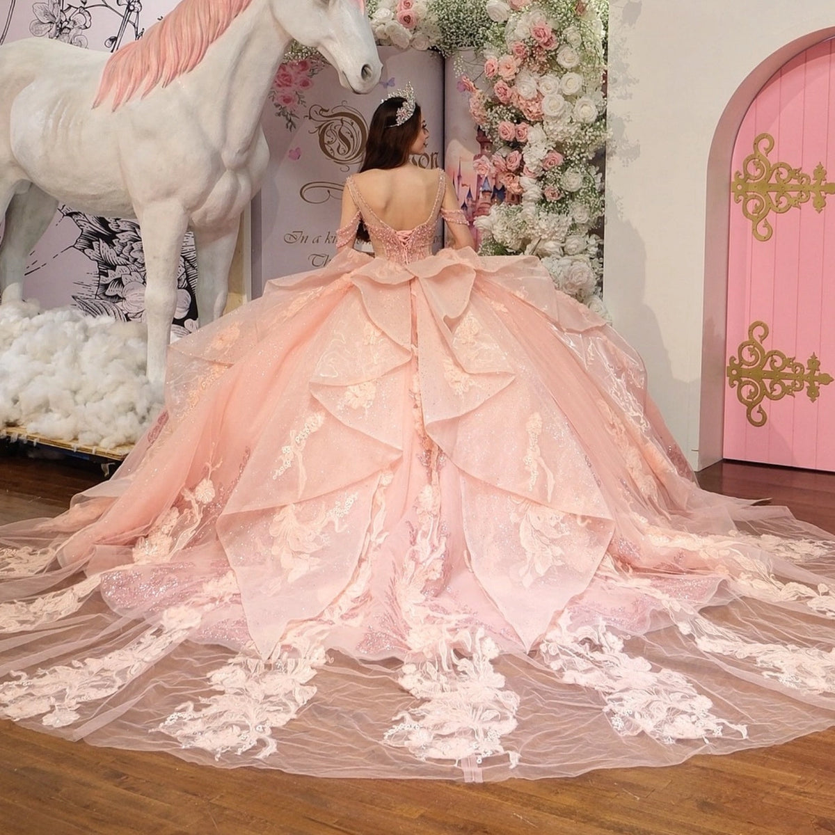Vedress blush pink layered ruffle quinceanera dress corset back long train floral appliques back view