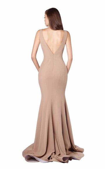 Back view of a taupe mermaid gown showing its low V-shaped back, center zipper and floor-length flared skirt