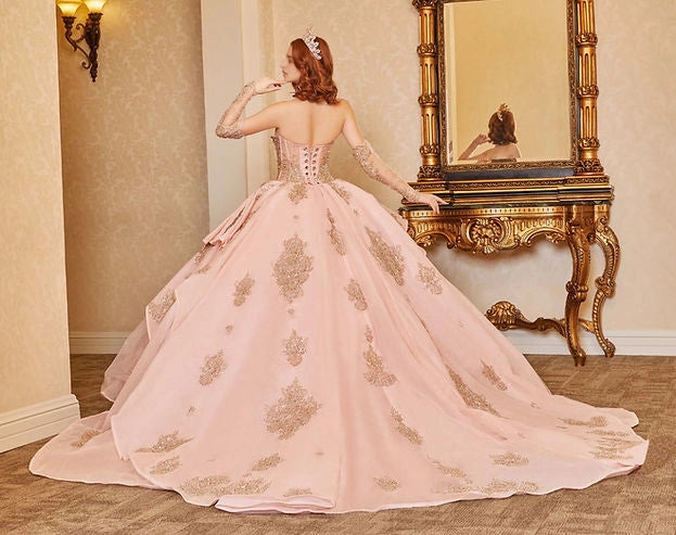 Vedress blush pink quinceañera gown lace-up corset back layered ruffle gold glitter train back view