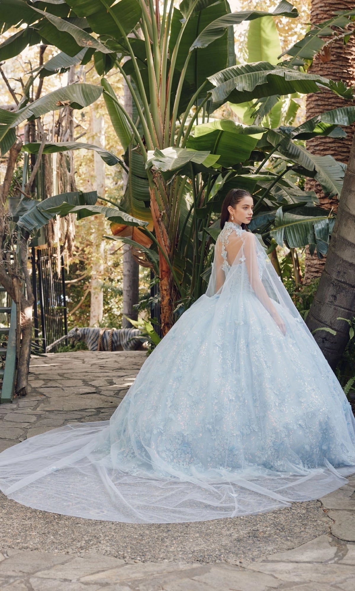 Vedress light blue quinceanera ball gown illusion lace back cathedral-length train detachable tulle cape 3D flower appliques back view