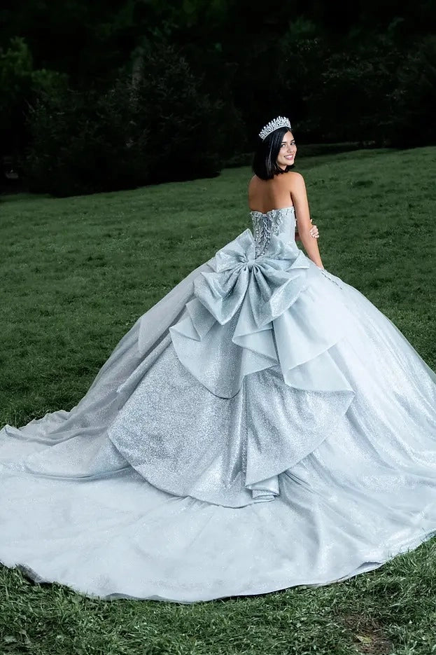 Vedress silver quinceañera dress corset lace-up back large layered bow long train back view
