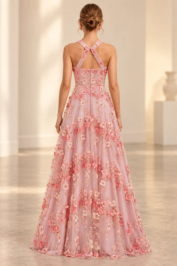 Back view of a Vedress pink floral tulle prom dress with flower-trimmed crossed straps, an open upper back and a floor-length A-line skirt.
