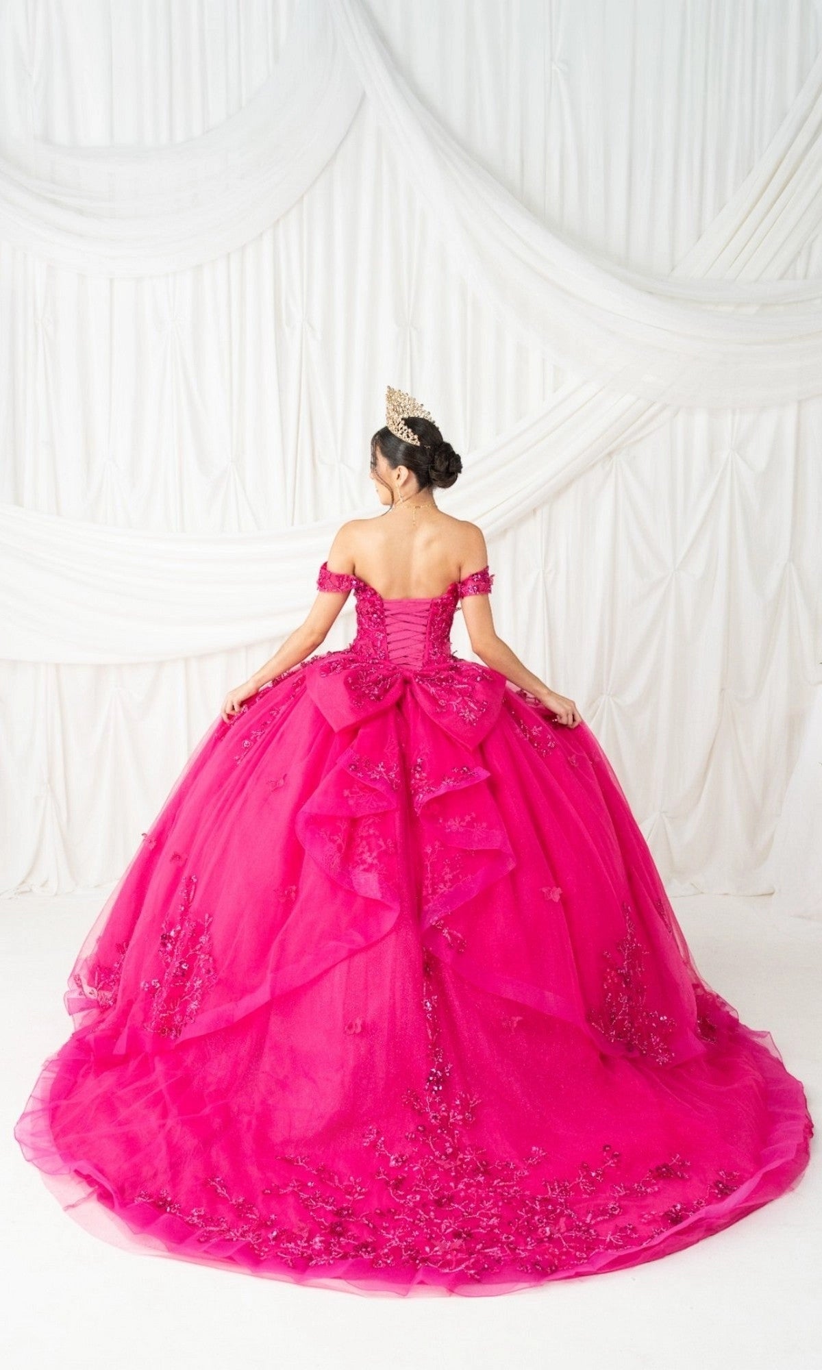 Vedress fuchsia tulle corset‑back quinceanera dress with large layered bow train back view