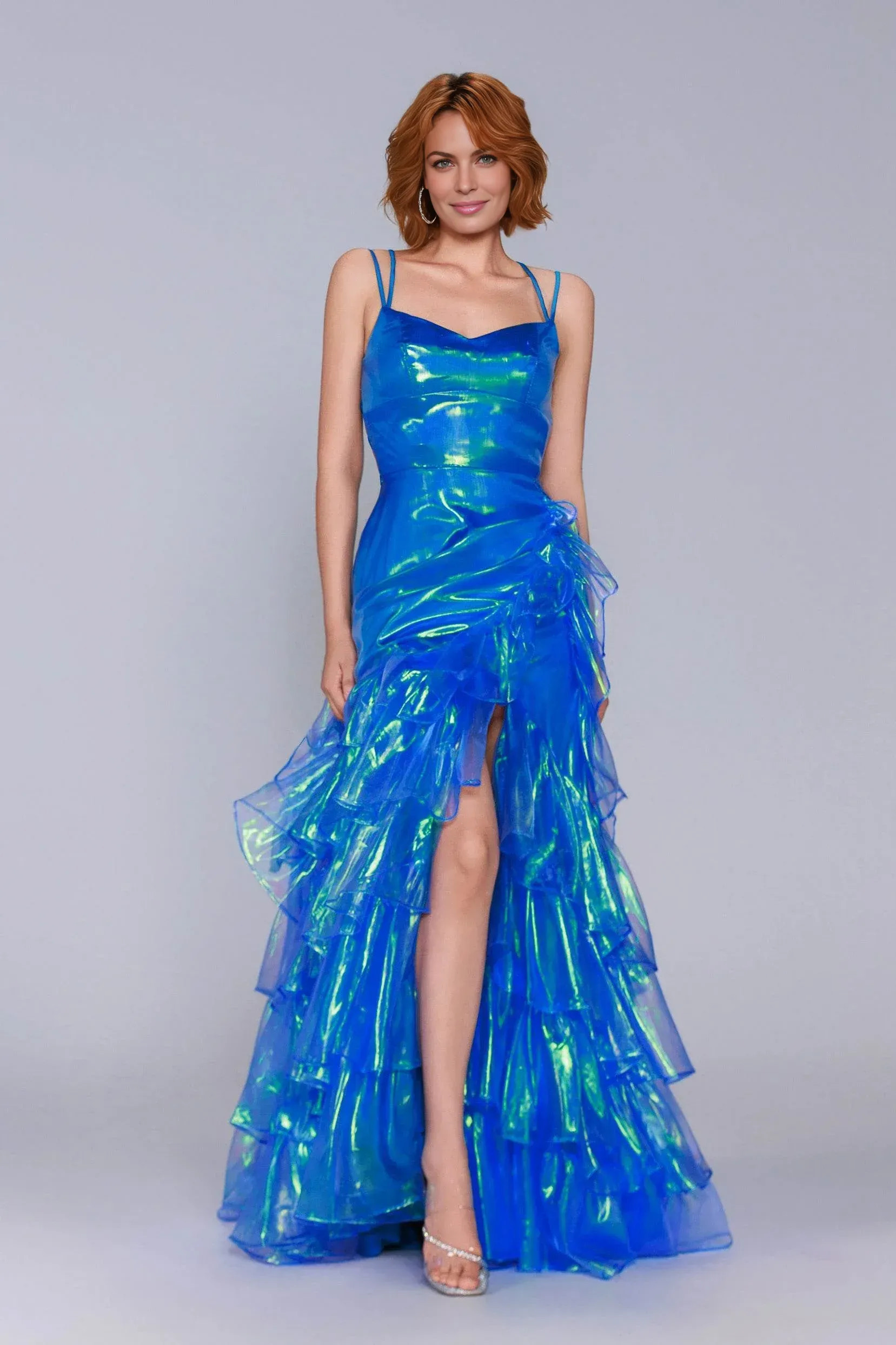 spaghetti strap prom gown with iridescent organza, tiered ruffle skirt, and front slit