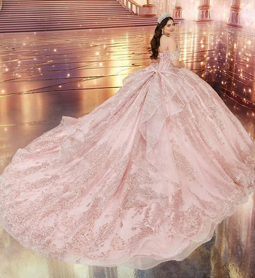 Vedress blush pink quinceañera gown lace-up corset back big layered ruffle bow long glitter tulle train back view