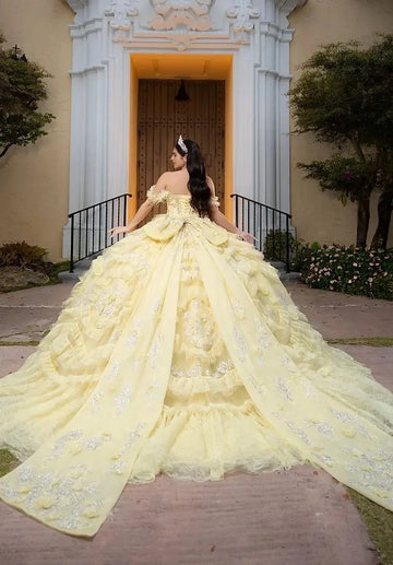 Back view Vedress pale yellow quinceanera gown corset lace-up back large bow long lace sequin train
