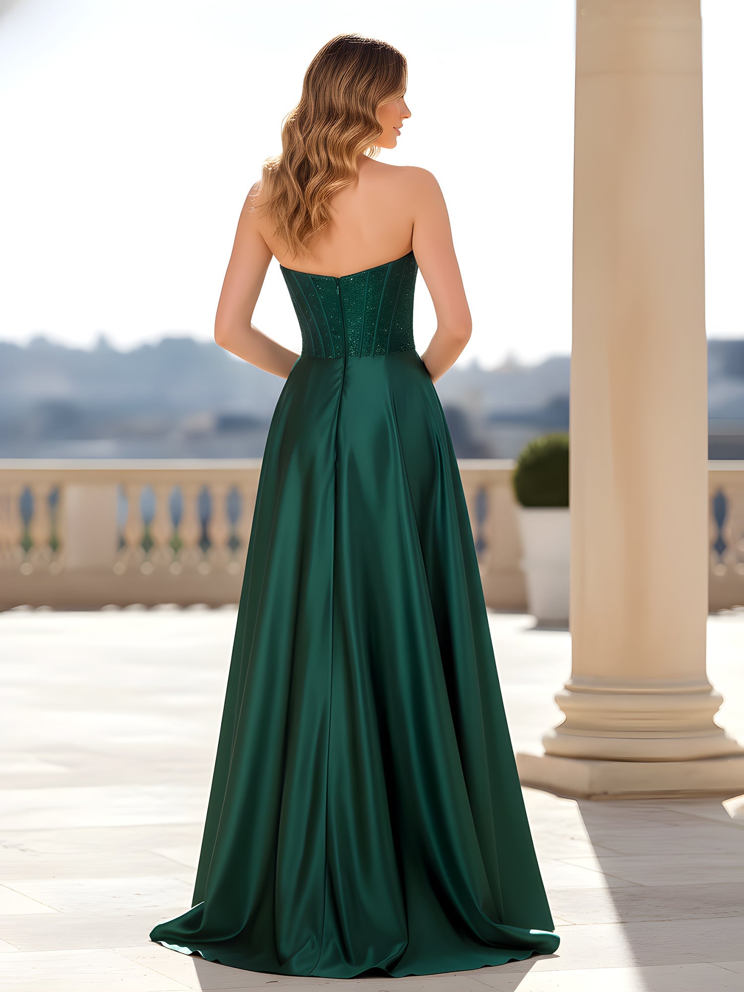 Back view of emerald green strapless satin formal dress with corset bodice, back zipper, A-line skirt, and floor-length hem by VEDRESS