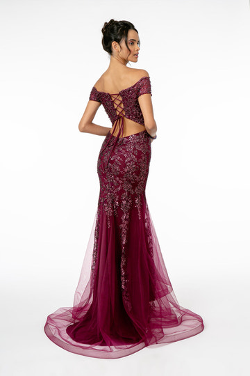Back view of off shoulder mermaid evening gown with lace-up open back, embroidered sequin tulle overlay, fitted skirt, and soft train by VEDRESS