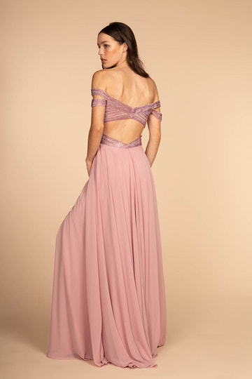 Back view of off shoulder A-line evening gown with open back, cross-strap beaded bodice, flowing chiffon skirt, and formal floor-length design by VEDRESS