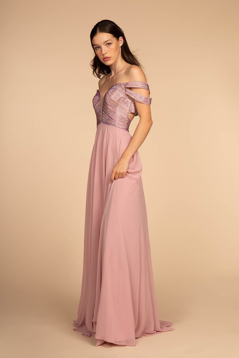 Off shoulder A-line prom gown with beaded embellished bodice, sleeveless design, flowing chiffon skirt, and floor-length formal style by VEDRESS