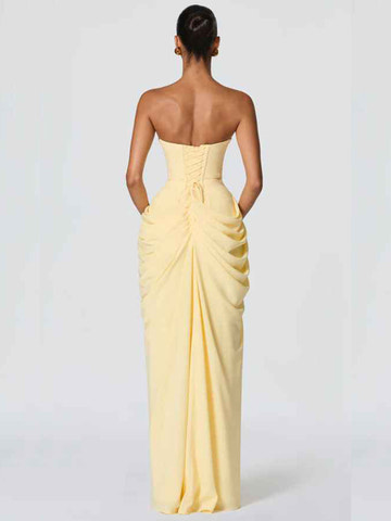 Open-back strapless formal gown with lace-up corset closure, ruched waist, sheath silhouette, and floor-length skirt