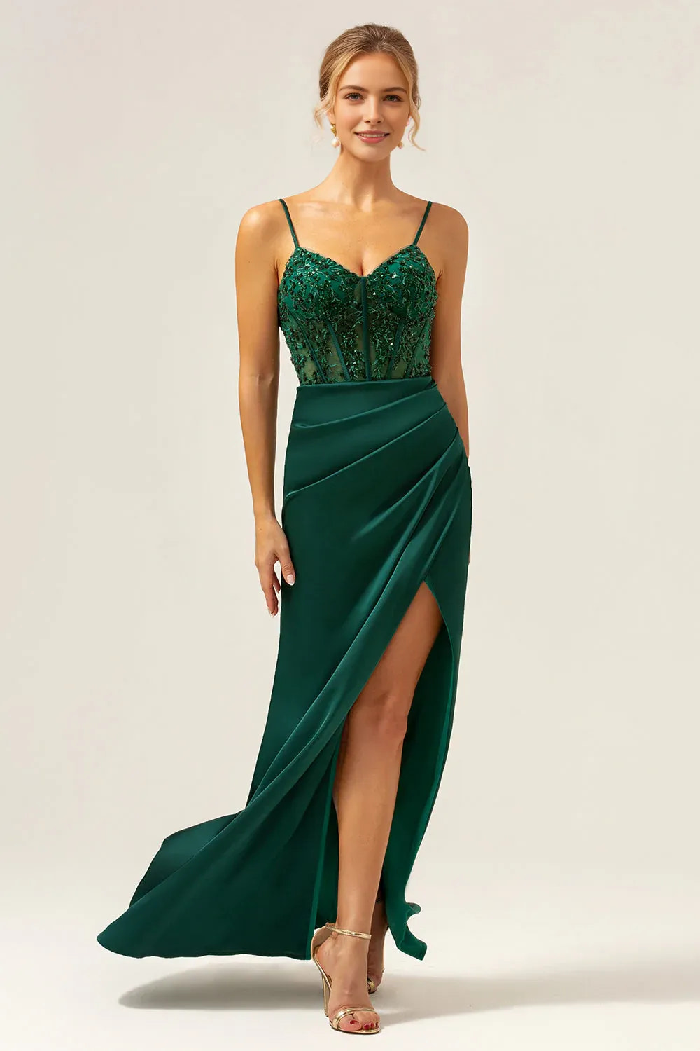 Sheath satin evening gown with sweetheart neckline, beaded corset bodice, spaghetti straps, and high slit