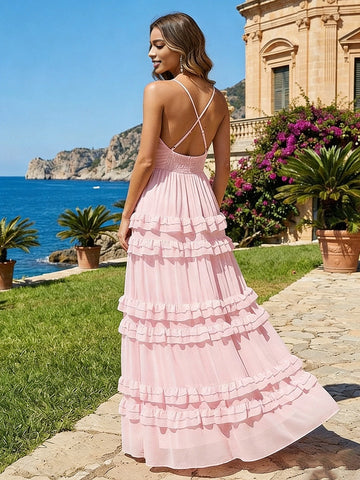 Back view pink chiffon maxi bridesmaid gown with criss‑cross straps and elastic smocked waist back