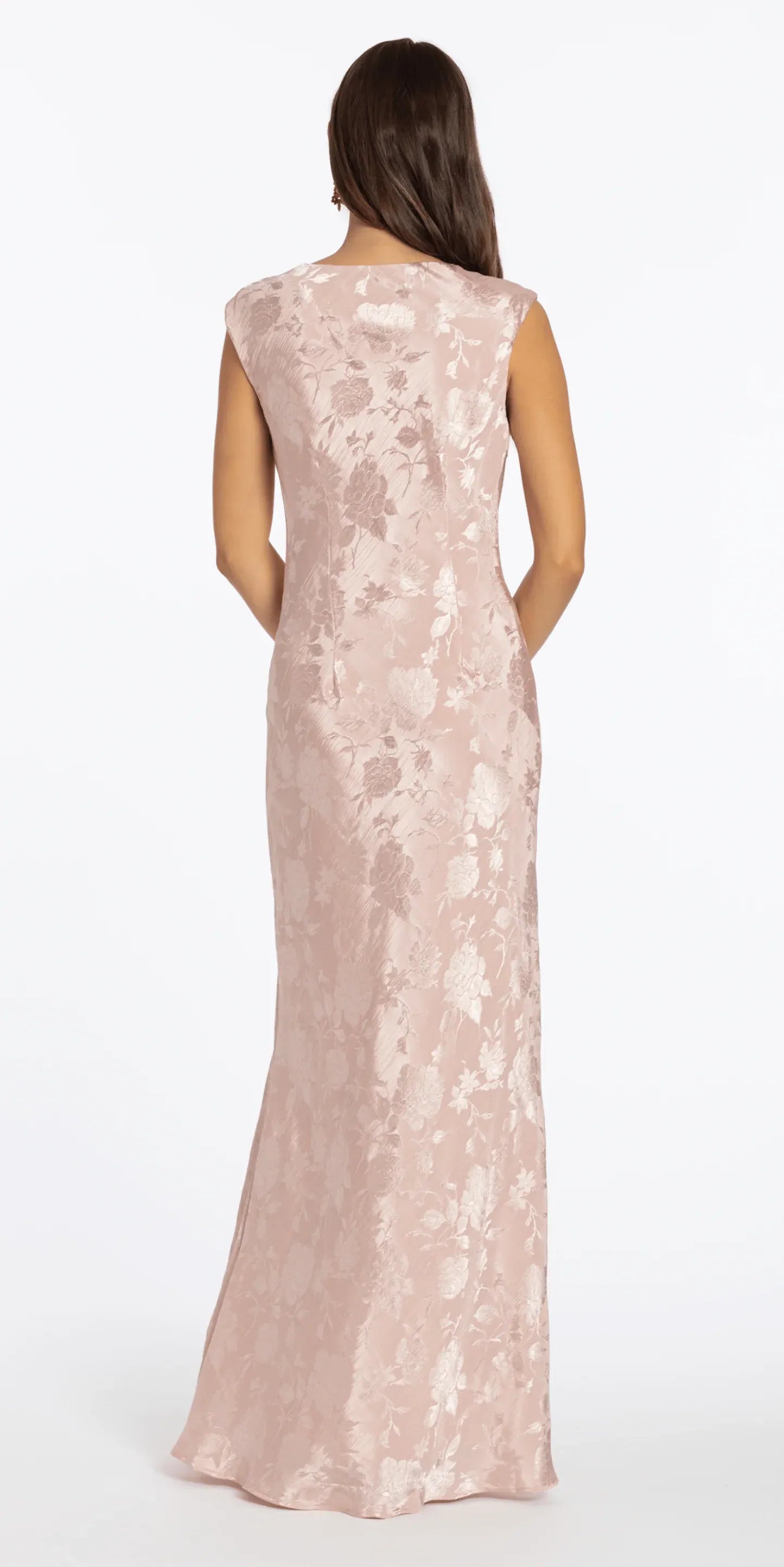 Back view of blush floral jacquard column formal dress with smooth covered back, sleeveless shoulders, slim floor length silhouette by VEDRESS