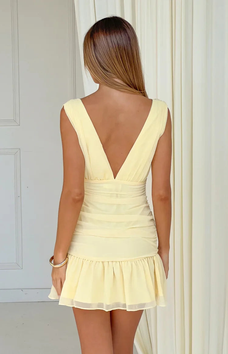 Vedress matching deep v back pale yellow ruffle hem mini cocktail dress back shot ruched waist detail