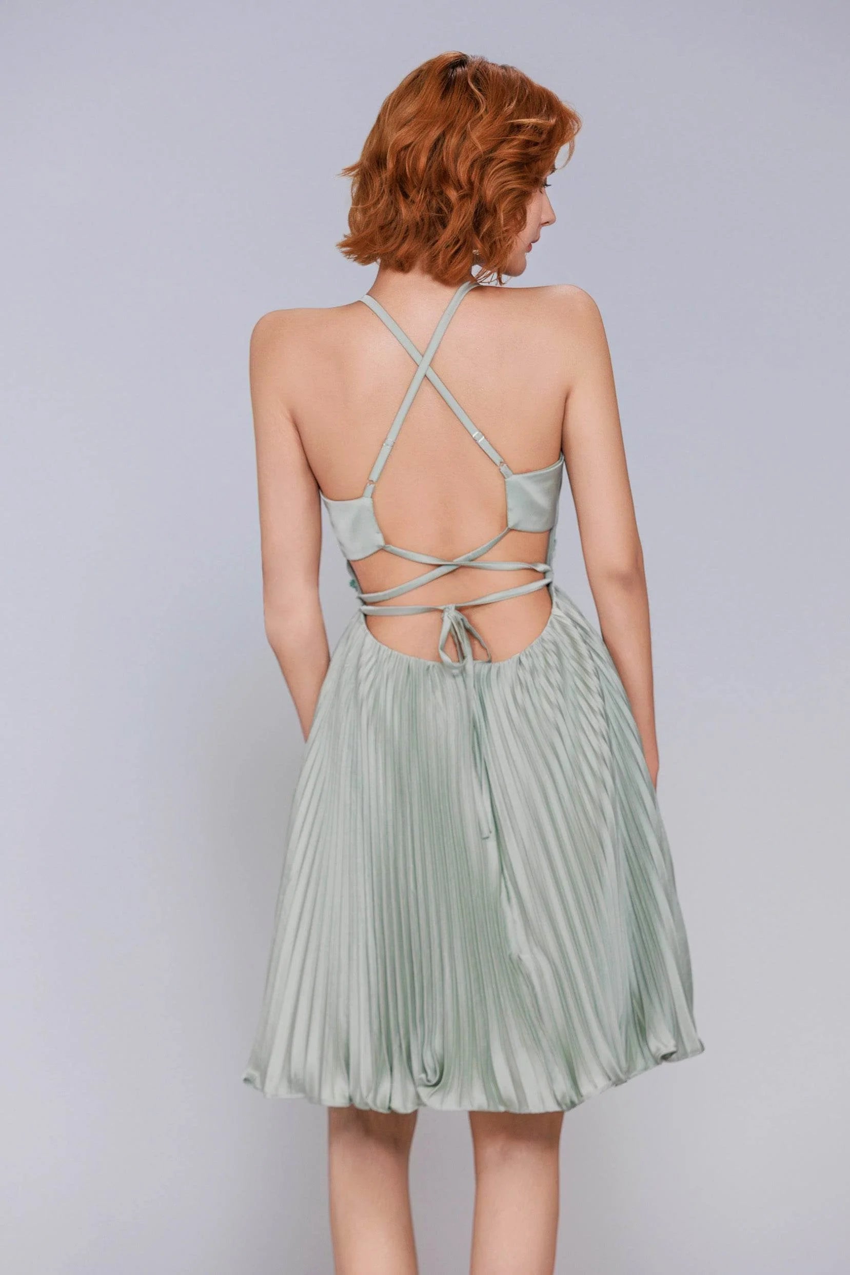 Graceful A-Line Plunge V-Neck Spaghetti Strap Pleated Satin Open Back Homecoming Dress