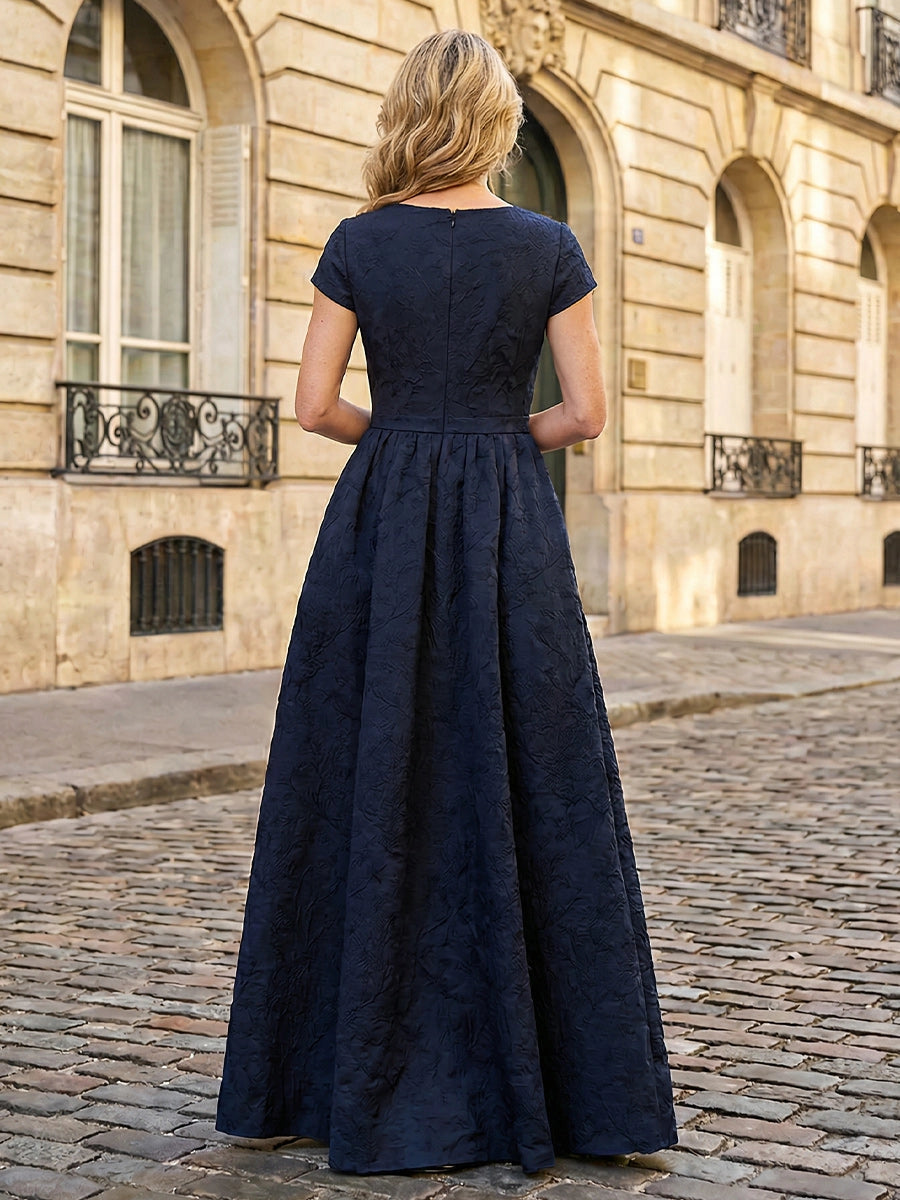 Back view of Vedress navy textured mother‑of‑the‑bride dress,simple zip‑back floor‑length a‑line formal gown