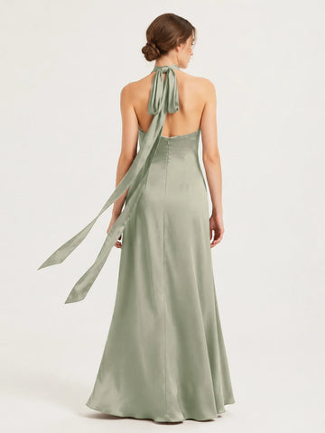 Back view of dusty sage satin halter bridesmaid dress with open back, tie-neck bow, long sash, hidden zipper, and floor-length skirt by Vedress