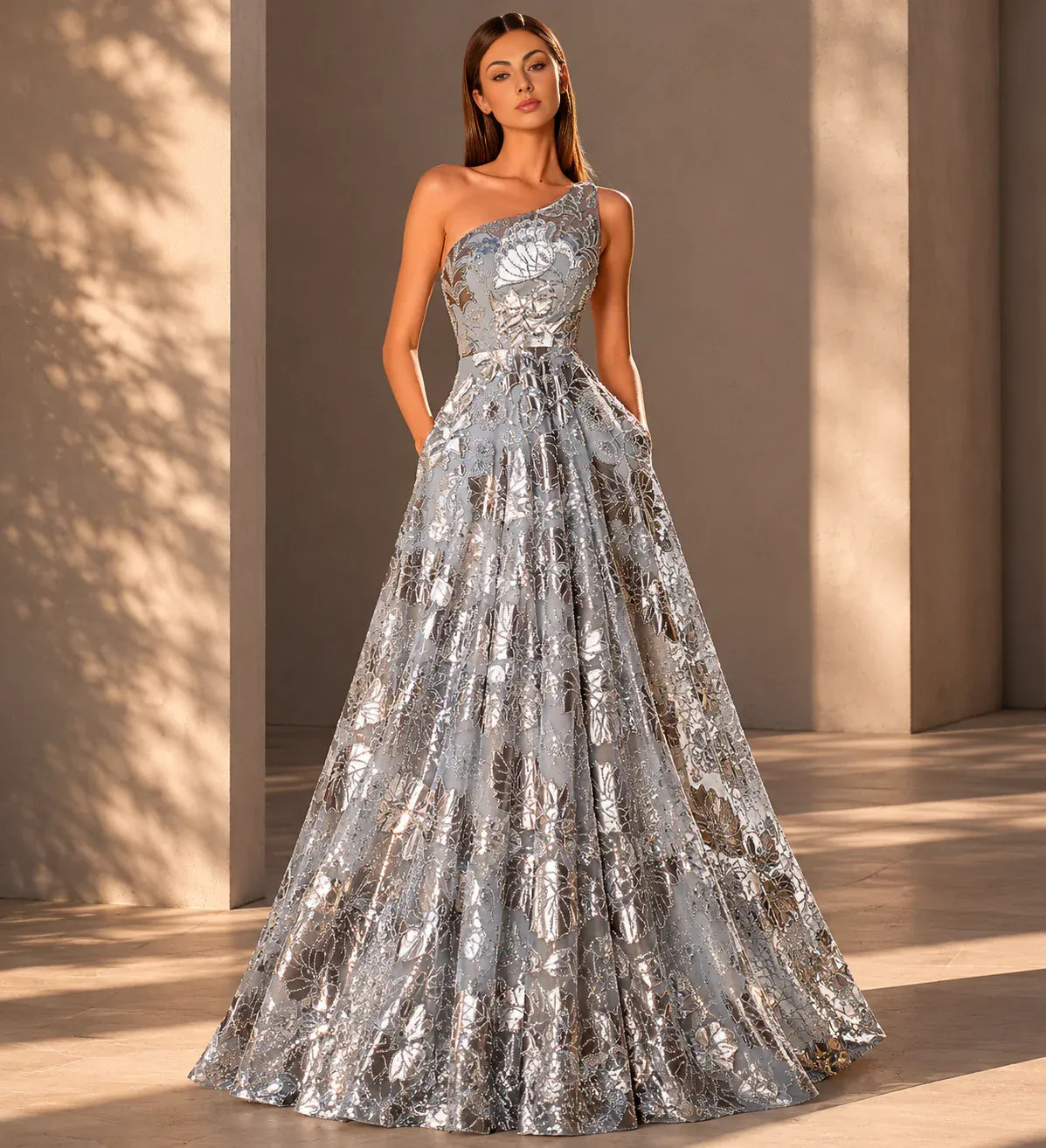 One-shoulder A-line prom gown with floral jacquard, structured bodice, and side pockets