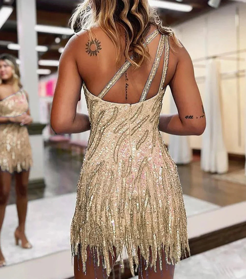 Glamoroso minivestido de fiesta de lentejuelas de un solo hombro con flecos