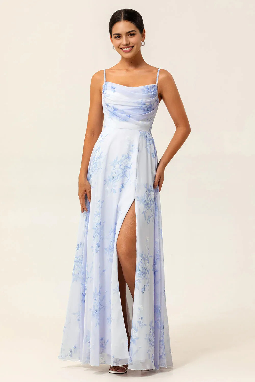 Floral chiffon A-line evening gown with cowl neckline, spaghetti straps, front slit, and lace-up back