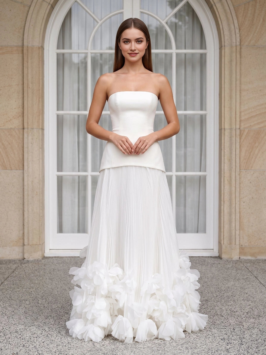 Ivory a‑line long wedding dress with strapless structured bodice pleated skirt 3D floral hem lace‑up back from Vedress
