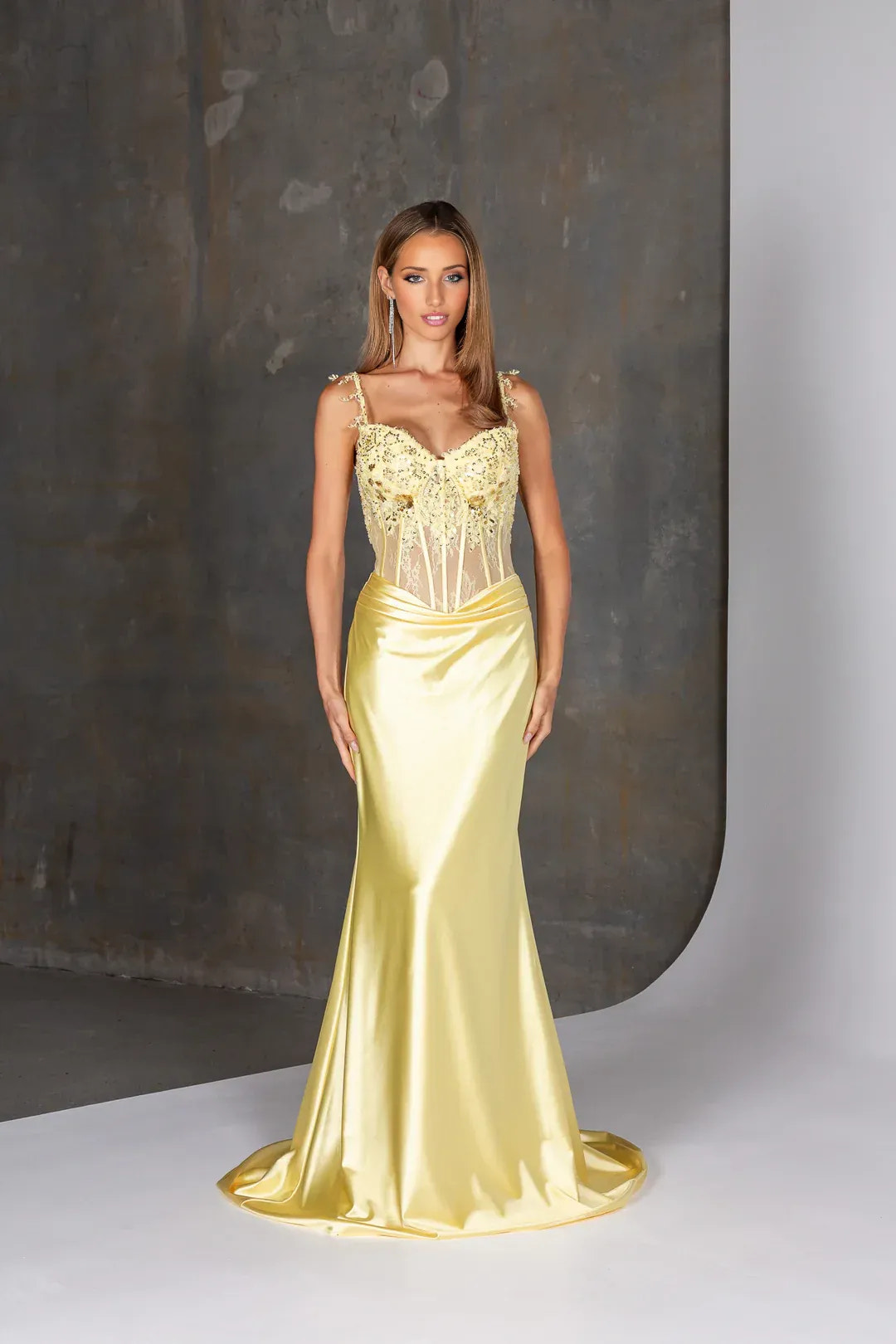 Spaghetti strap mermaid prom gown with beaded applique bodice, illusion corset, and satin skirt