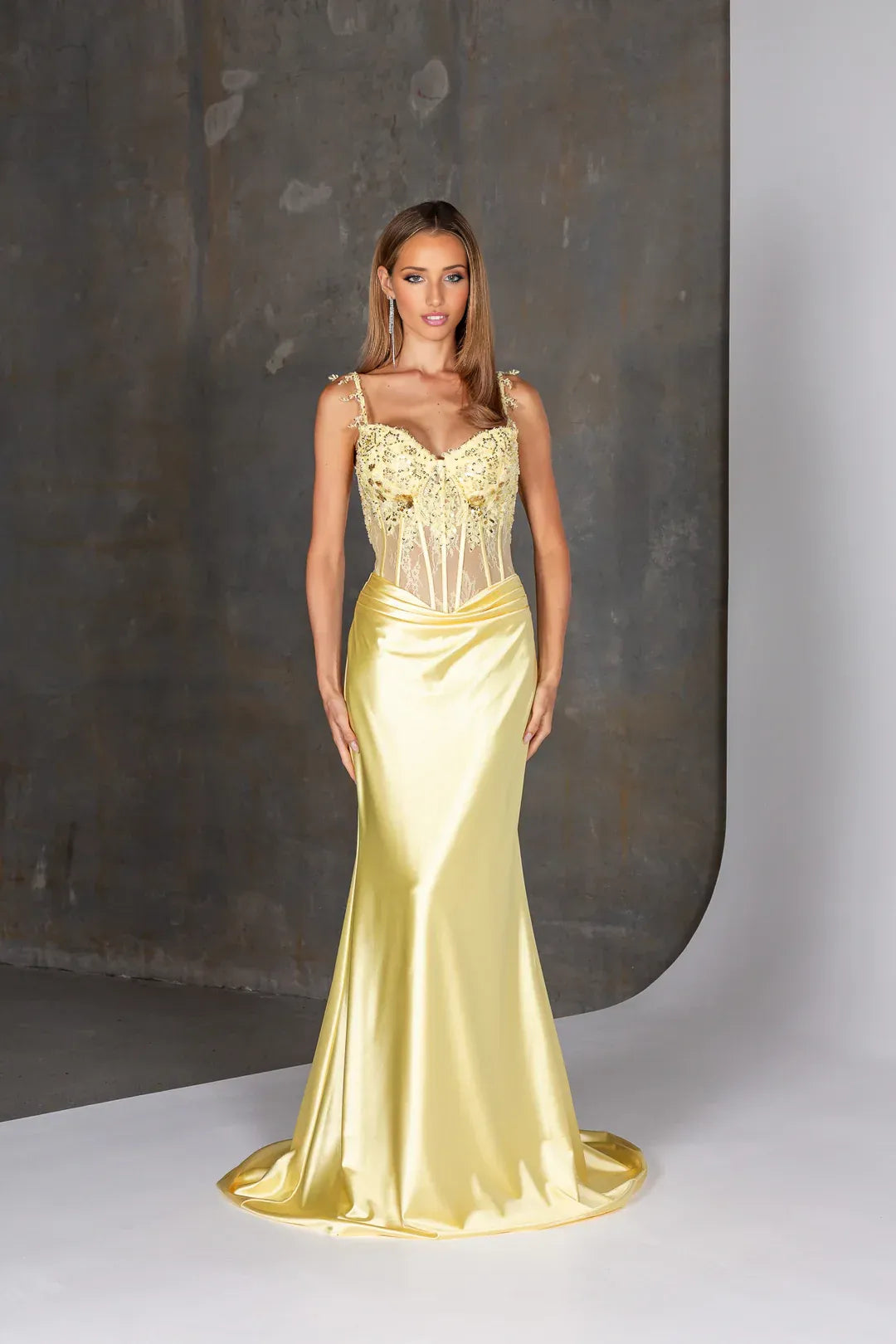 Spaghetti strap mermaid prom gown with beaded applique bodice, illusion corset, and satin skirt