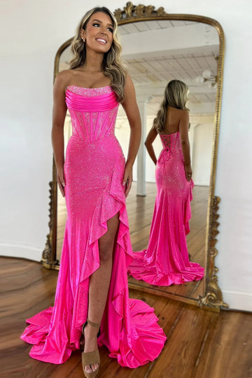 Glamoroso vestido de fiesta largo estilo sirena sin tirantes con corsé, volantes, abertura y pedrería