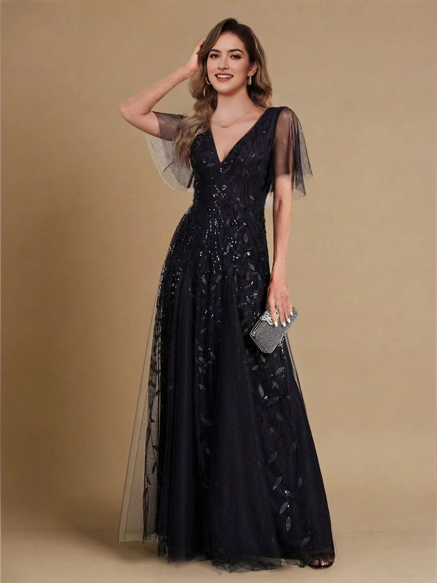 Vedress navy mother of the bride dress,front view deep V‑neck,sheer mesh flutter short sleeves,leaf sequin embroidery,flowy a‑line tulle floor skirt,tan solid studio background