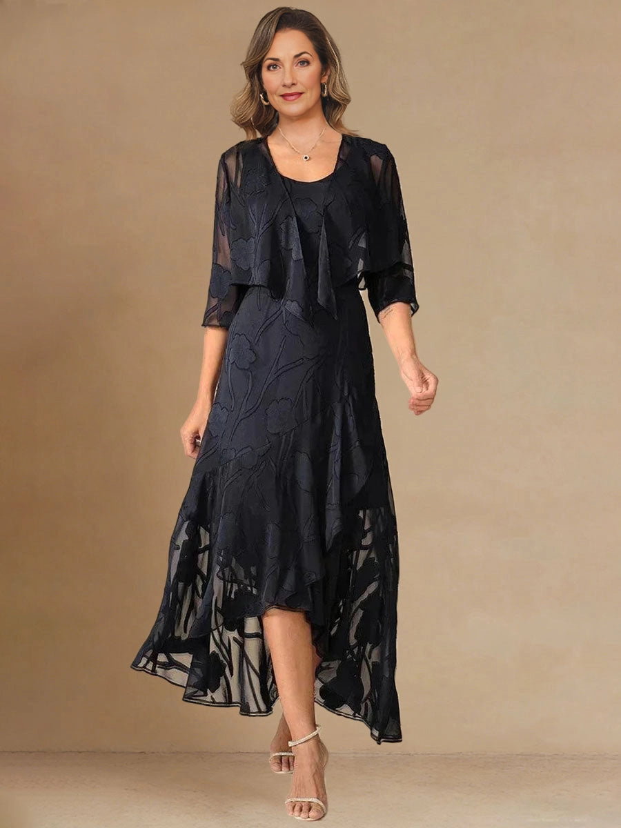 Vedress navy mother of the bride dress,front view scoop neck sleeveless high‑low dress,matched 3/4 sleeve sheer chiffon bolero,floral burnout fabric,beige studio background