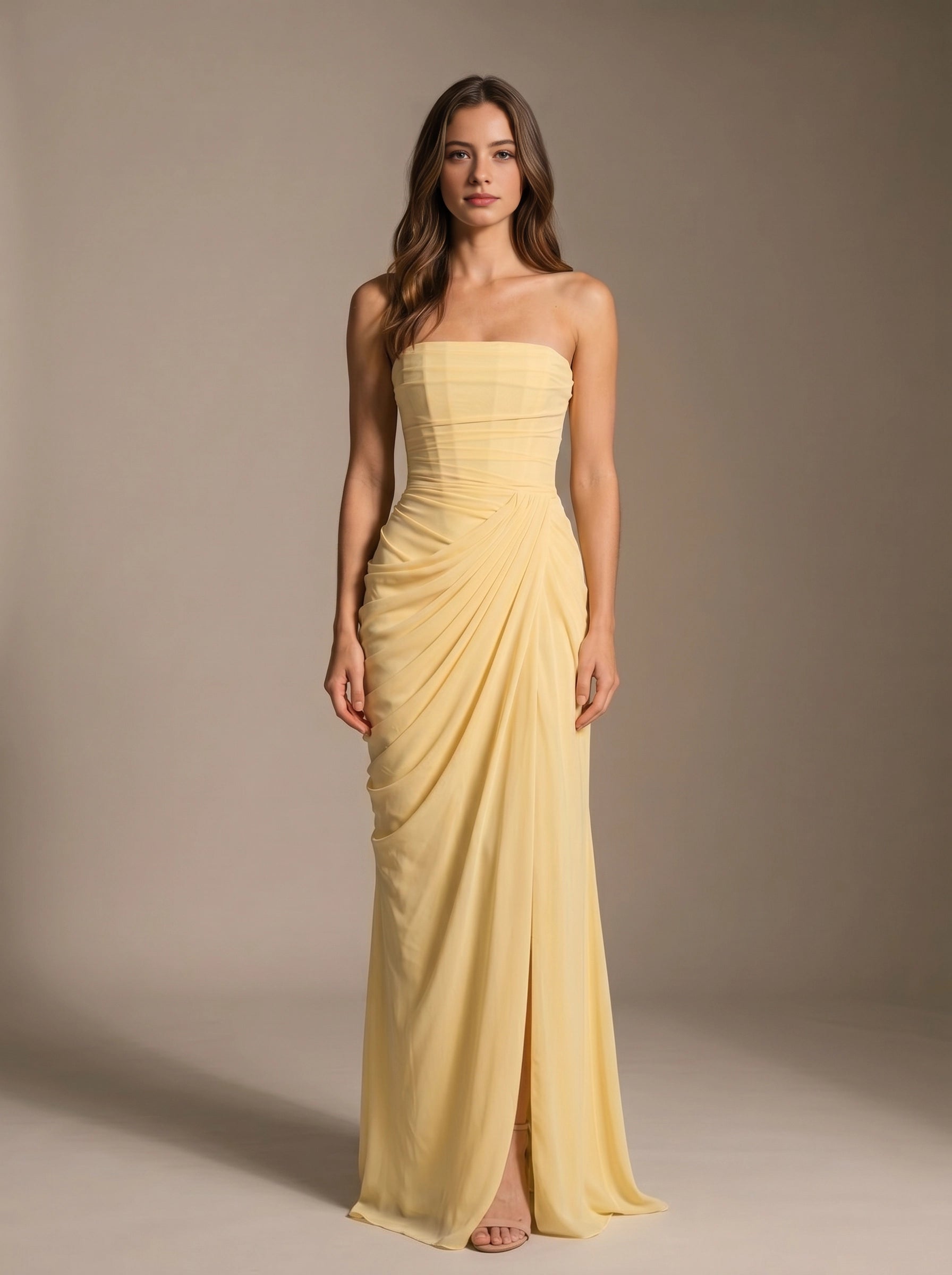 Vedress pale yellow bridesmaid dress,front view strapless neckline,ruched draped chiffon,high front slit,mermaid floor‑length silhouette,studio plain background