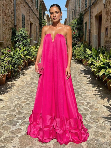 Vedress hot pink strapless long wedding guest gown with 3D petal skirt hem front view