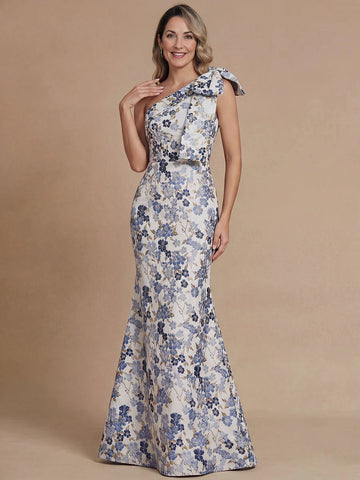 Vedress white‑blue floral mother of the bride dress,front view one‑shoulder with decorative bow,fitted mermaid floor‑length silhouette,neutral beige background