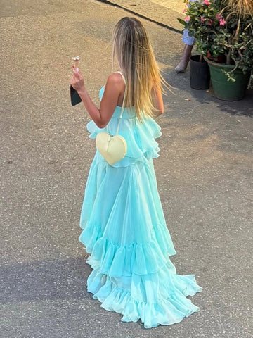 Back view aqua prom dress with strapless bodice layered waist and flowing tiered ruffle skirt