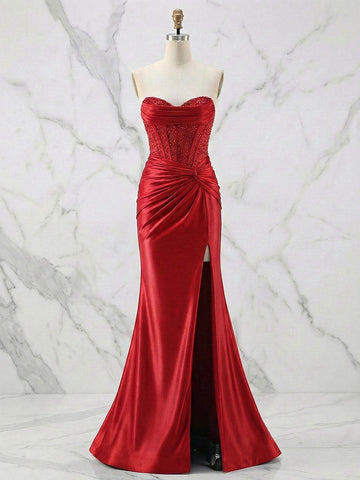 Vedress red satin mermaid prom dress with a strapless sweetheart neckline, beaded bodice, ruched waist, and high slit, front view.