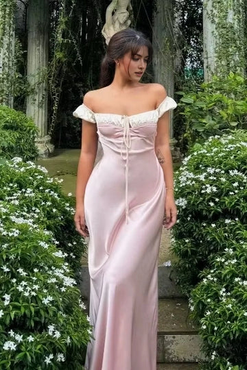 Blush off-shoulder satin wedding guest dress with puff sleeves and floor-length sheath silhouette by Vedress