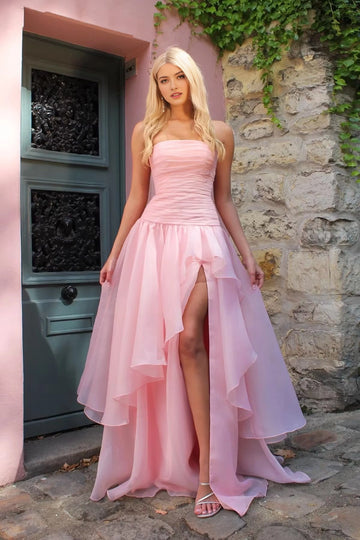 Blush pink strapless prom dress with ruched bodice layered high-low skirt and front slit by Vedress