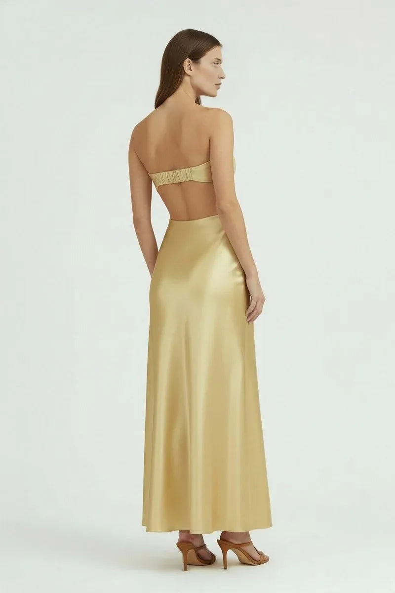 Open-back strapless satin formal dress with bandeau bodice, side cutouts, and elegant maxi skirt for special occasions