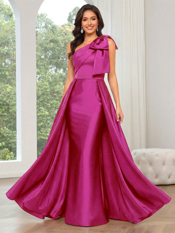 Magenta one-shoulder satin formal gown with statement bow detail, A-line skirt, and floor-length evening dress silhouette