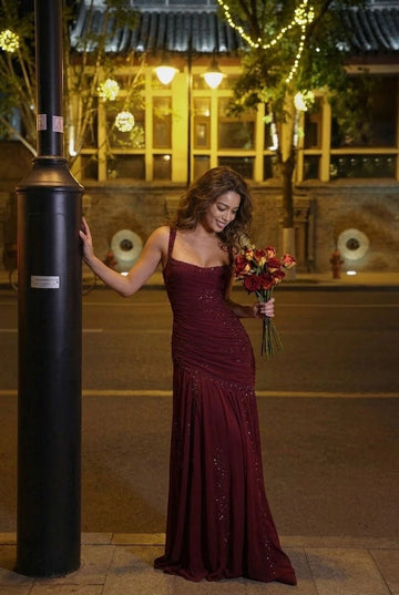Burgundy square neck floor-length prom dress with ruched bodice and sparkle accents